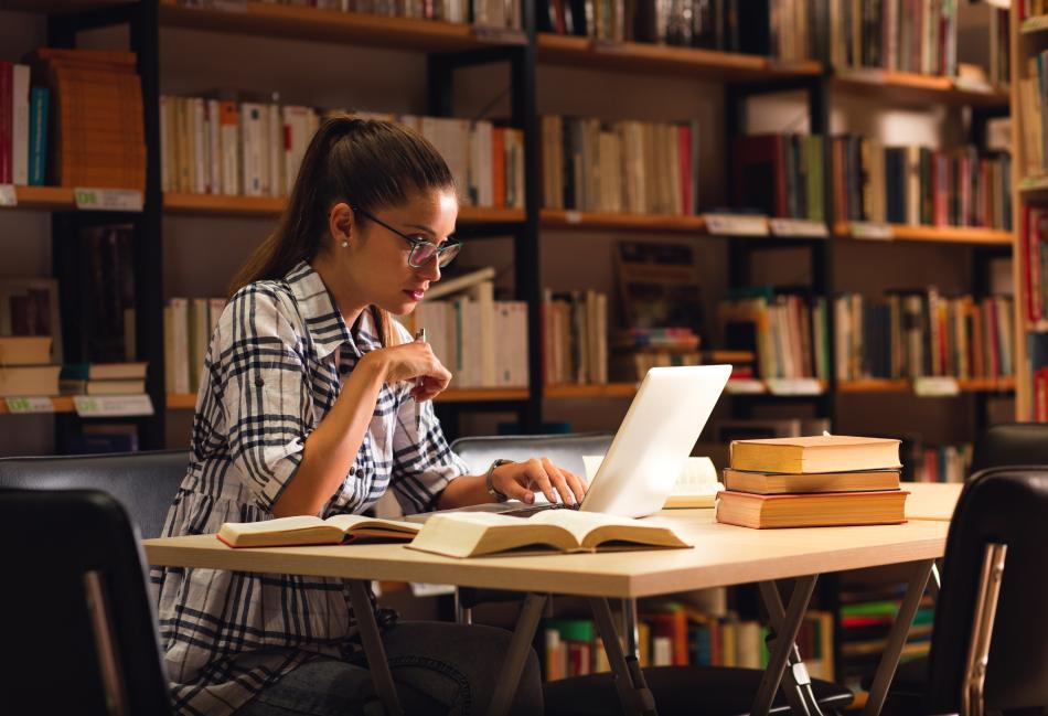 Literary researcher in a library